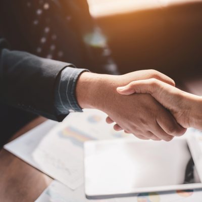 Success business and partnership business concept, Business people shake hands to agree to join business